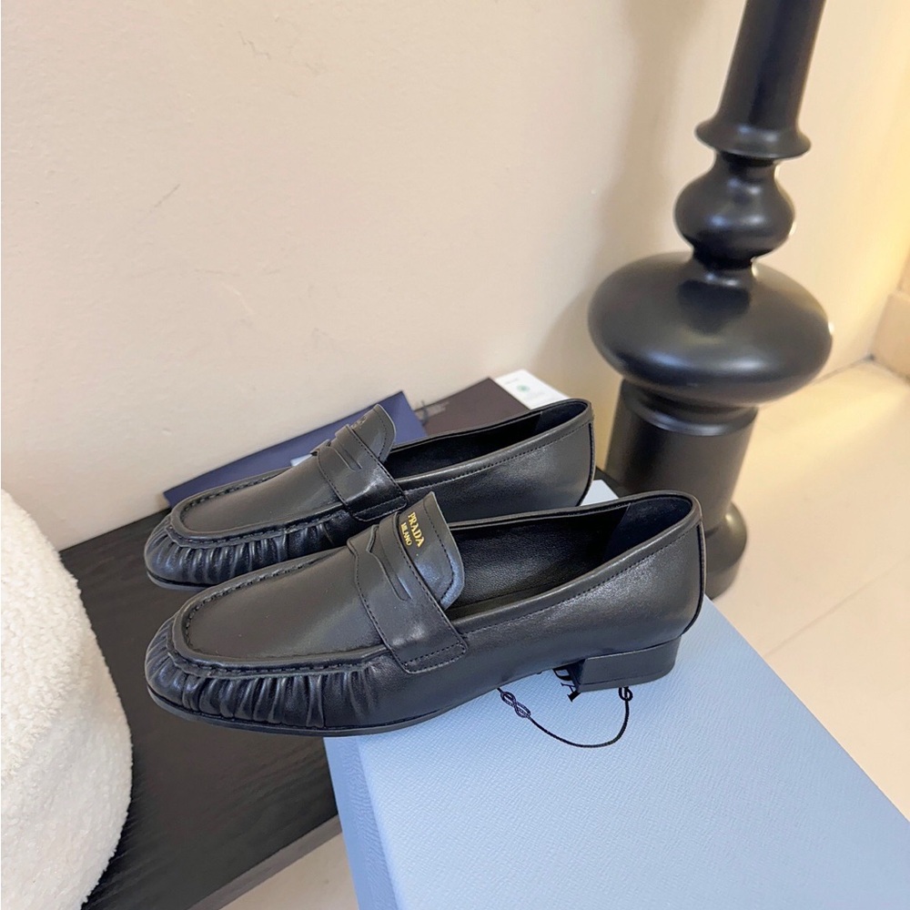 Prada Black Leather Loafers with Gold Accent - Picture 6 of 6